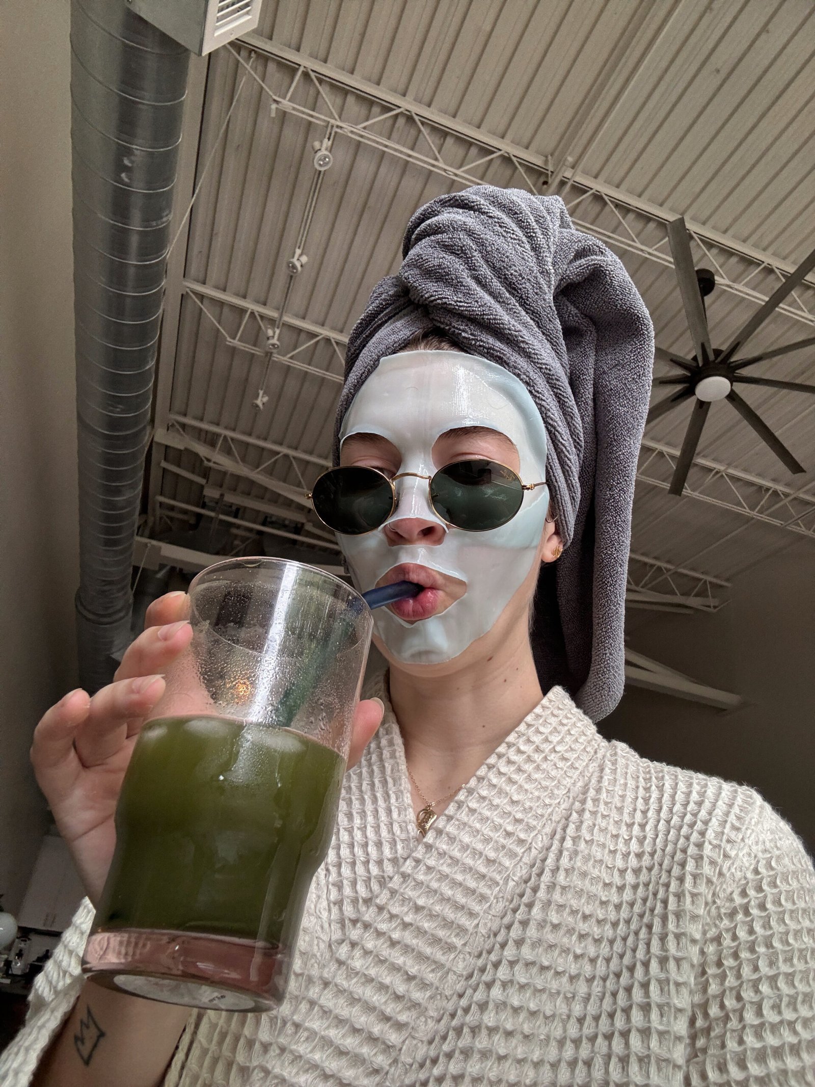 Woman doing a skincare routine with a face mask at home