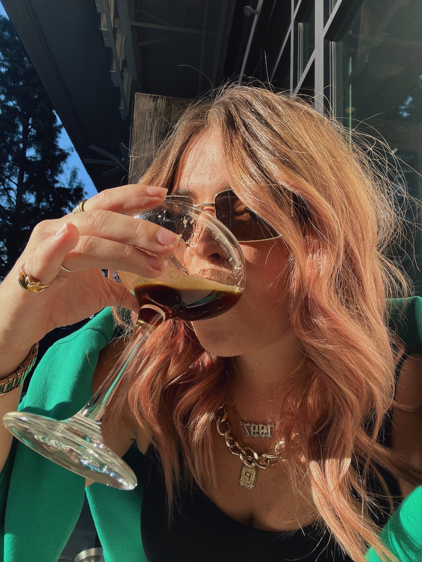 Woman sipping espresso